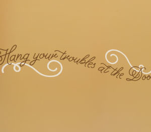 Hang your troubles at the door Wall Decal