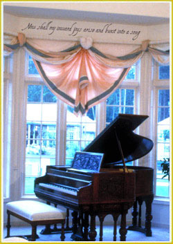 music wall words on wall over piano in music room