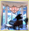 music wall quote on soffit over piano in music room