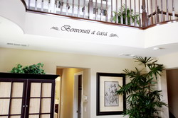 italian hospitality wall lettering along balustrade 