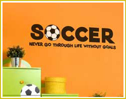 kid's room wall quote above cabinet in kid's sports themed bedroom