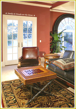 style wall decal above glass paneled door in African family room