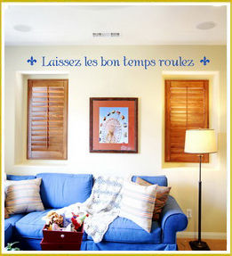 inspirational french wall decal above windows in family room 