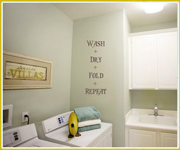 wall words in laundry room over washing machine wash dry fold repeat