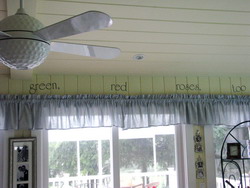 Wall Words on Hope and Dream above the windows with chandelier on the side