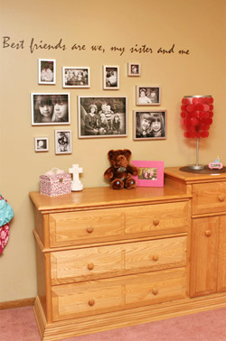 A wall lettering with the best friend's photo collage, and a dresser in the bedroom.