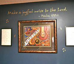 A bible verse wall quotation with 3 picture frames and musical notes on the background - Make a joyful noise to the lord. Psalm 100:1