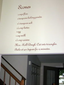 Scones recipe wall decal in the kitchen area facing the stairway.
